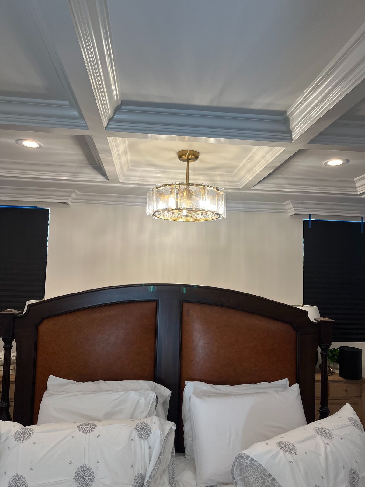 Designer pendant lighting in a coffered ceiling