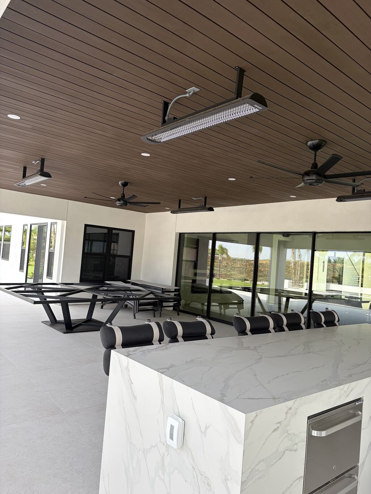 Outdoor patio ceiling fans and lighting installed by All Current Electric