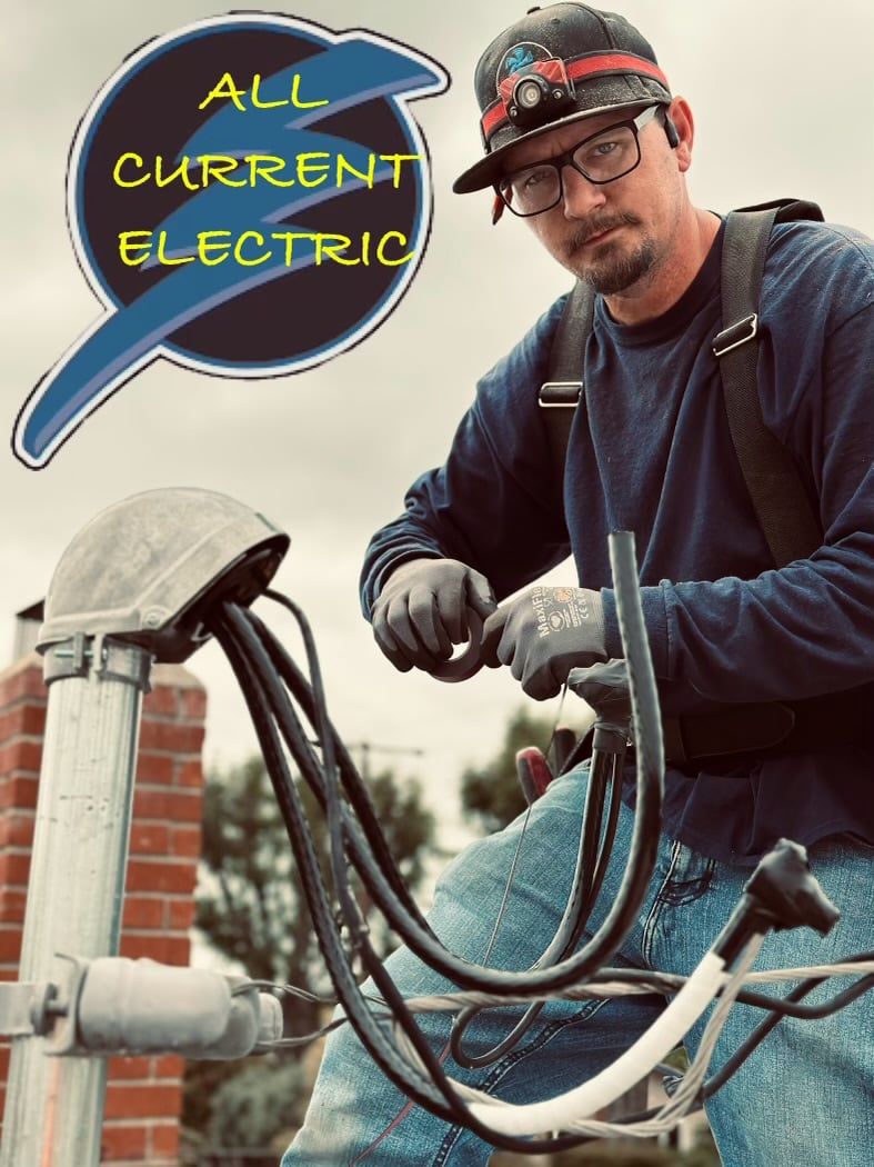 Electrical worker installing cables near brick wall with "All Current Electric" logo