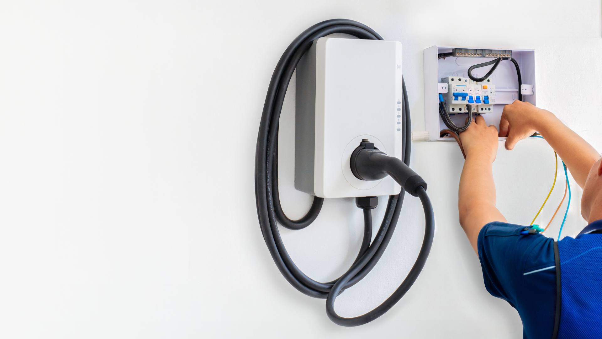 Level 2 EV wall charger installed in a home garage